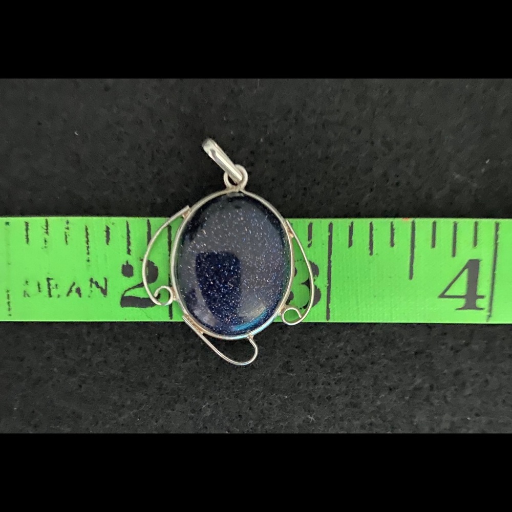 Oval Blue Goldstone Pendant Set In Sterling Silver